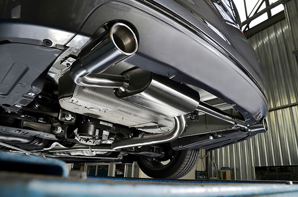 Why Does My Car's Exhaust Make a Metallic Rattle at Certain RPMs?